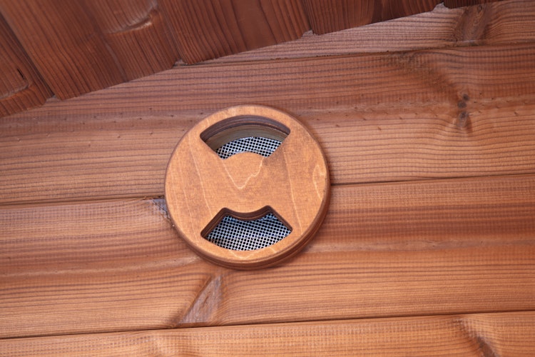 Wolff Finnhaus Saunahaus Steen in Ovalform inkl. schwarzen Dachschindeln