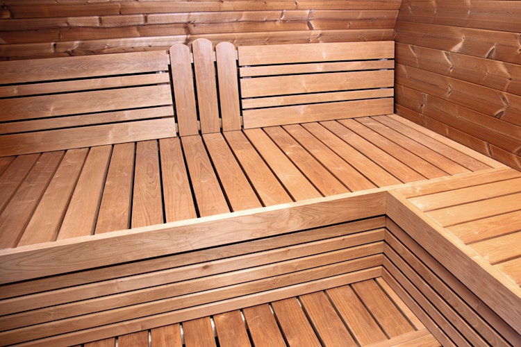 Wolff Finnhaus Saunahaus Steen in Ovalform inkl. schwarzen Dachschindeln