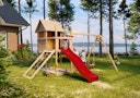 Vorschaubild Akubi Stelzenhaus Frieda mit Wellenrutsche, Doppelschaukelanbau und Netzrampe